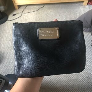 Oversized black pebbles leather wristlet